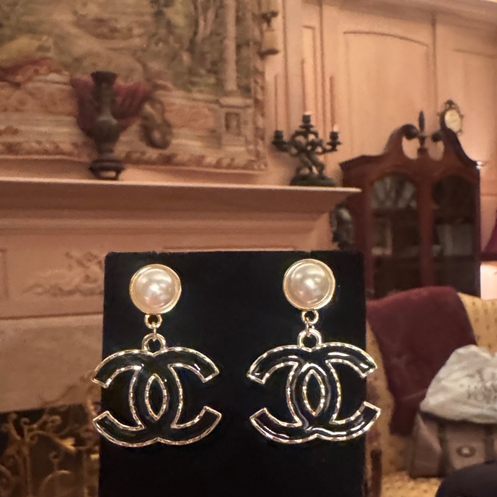 CC earrings signed in back